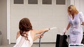 Petite small tits stepdaughter taught a lesson when she hosed her busty stepmom.The big boobs cougar spanks her and makes her lick her pussy and ass