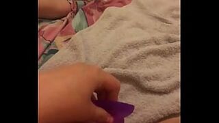 Wife fucking herself with dildo