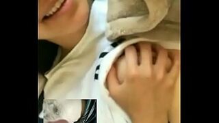 Hot Asian babe watches me wank and plays with her tits